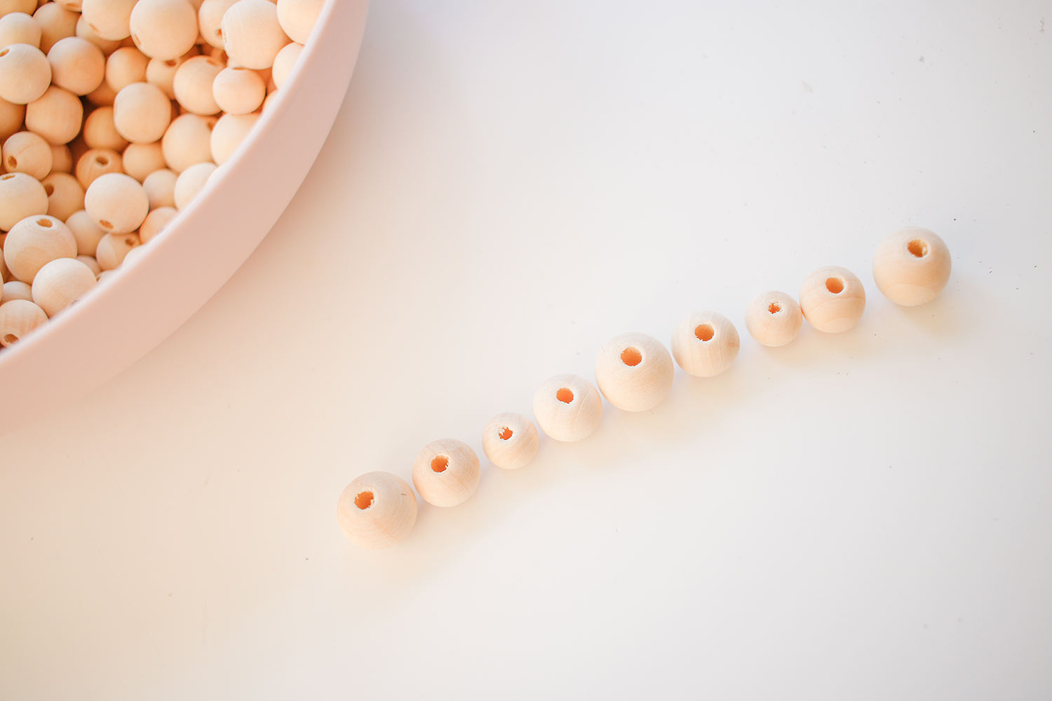 Plant hanger with beads