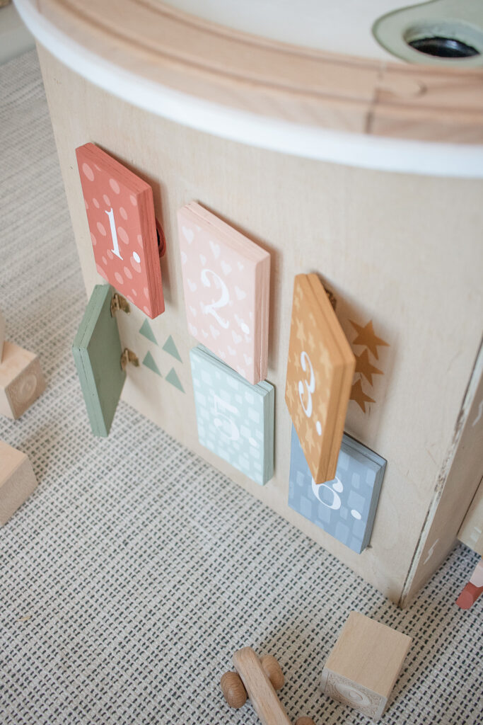 DIY Activity Cube Center for Babies and Toddlers - Wooden & Cute! Make the perfect toy for your baby or toddler - boy or girl!